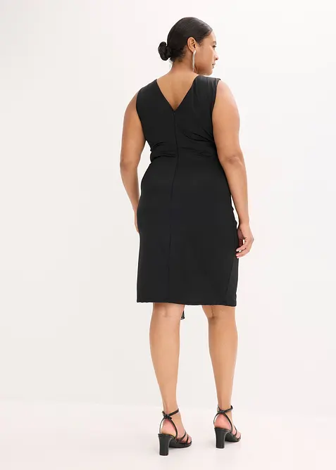 Jerseyklänning med strassapplikation, bonprix