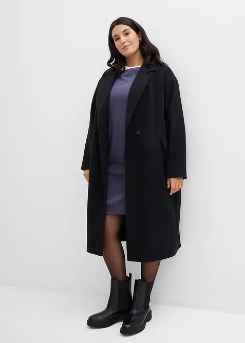 Trikåklänning med 3/4-ärm och mjukt ruggad insida, bonprix