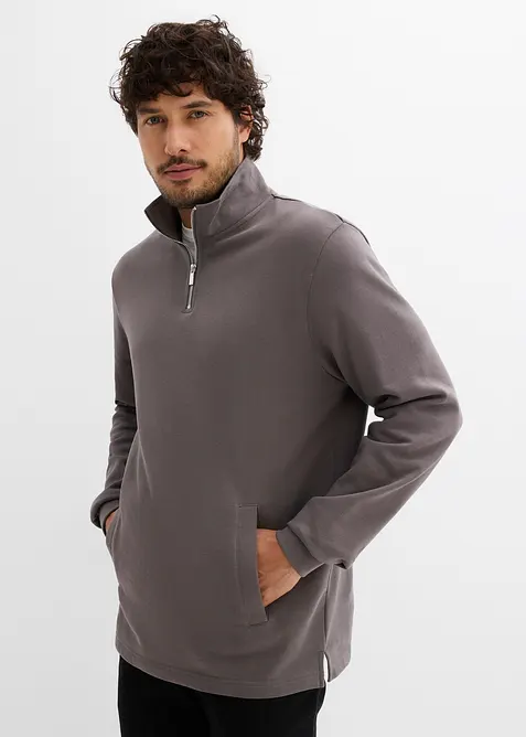 Sweatshirt i ekologisk bomull, med praktiska fickor och rak nederkant, bonprix