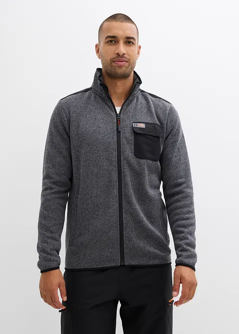 Jacka av stickad fleece med praktiska fickor och sportiga detaljer, bonprix