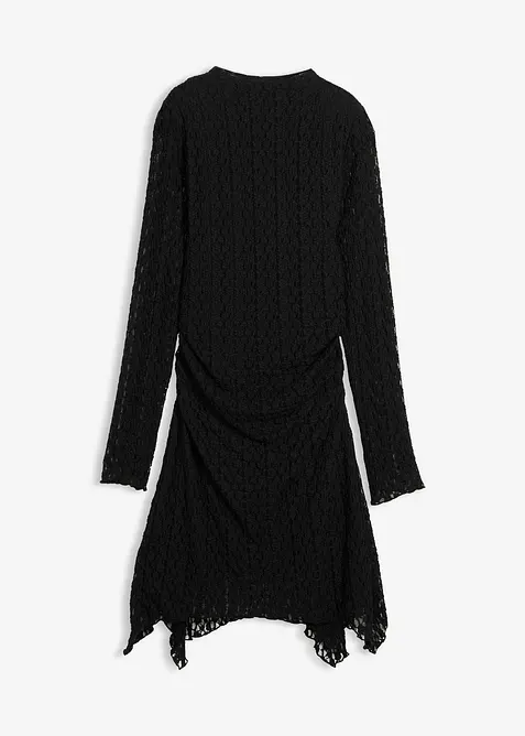 Spetsklänning med flikig nederkant, bonprix