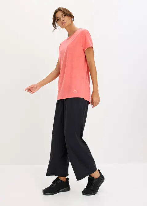 Bekv&auml;m sportbyxa i caprimodell med vida ben, bonprix