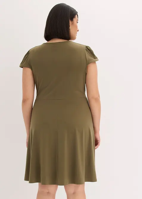 Jerseykl&auml;nning med prydnadssp&auml;nne, bonprix