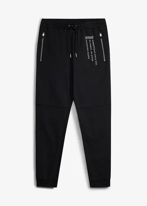 Joggingbyxa i bomull med sportigt tryck, bonprix