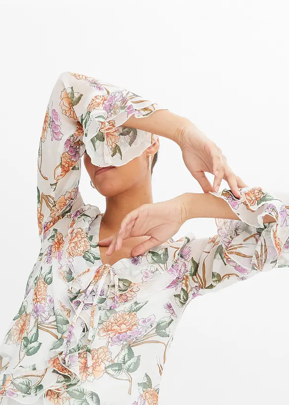 Mönstrad blus med volanger, bonprix