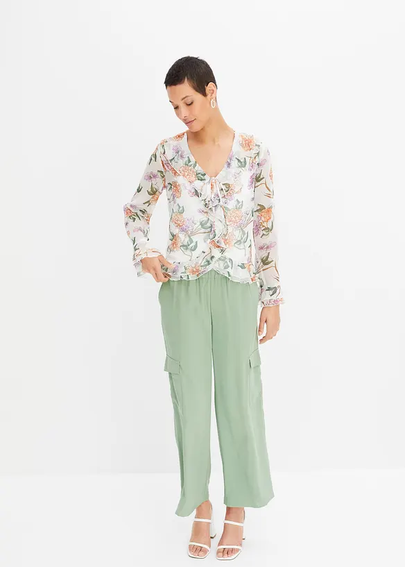 Mönstrad blus med volanger, bonprix