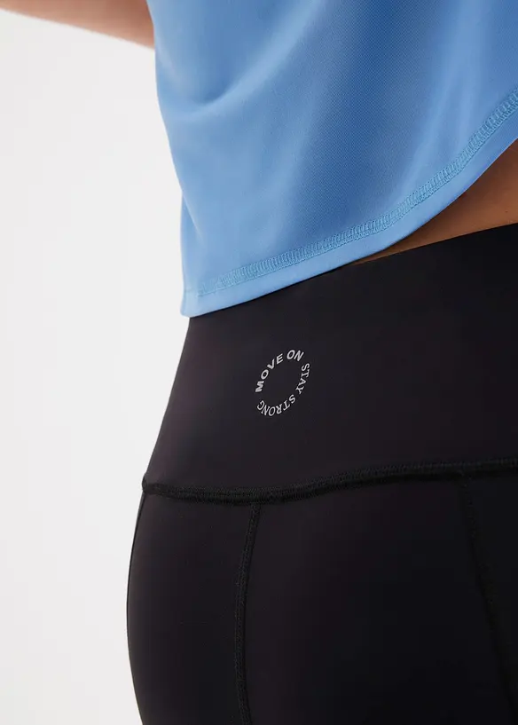 Snabbtorkande sportleggings i caprimodell med mobilficka, bonprix