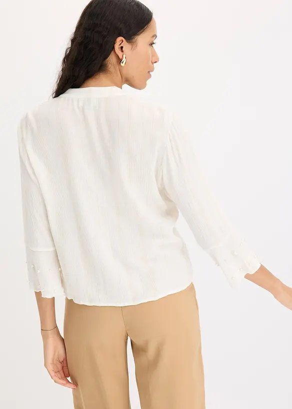 Blus med volang och pärlor, bonprix