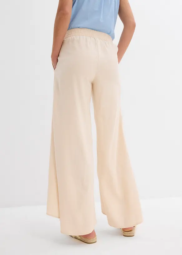 Byxa i kortare modell med slits, bonprix