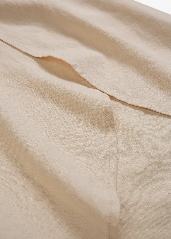 Byxa i kortare modell med slits, bonprix