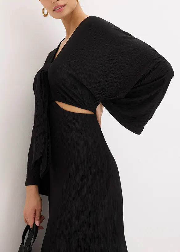 Mellanlång klänning med cut-outs, bonprix
