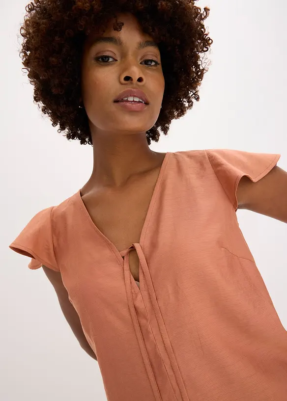 Blus med volangärmar i  glansigt material, bonprix