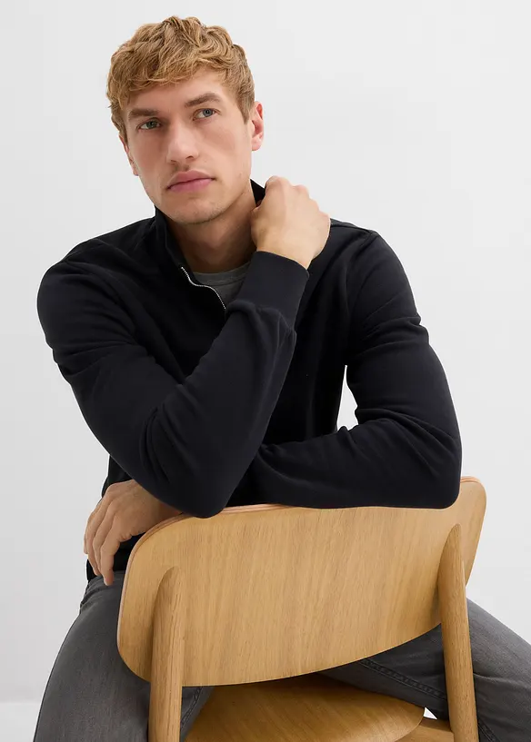 Sweatshirt i ekologisk bomull, med praktiska fickor och rak nederkant, bonprix