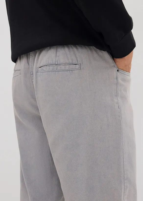 Dra-på byxa av bomull i Relaxed Fit med Tapered ben, bonprix