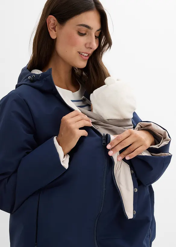 Vändbar mammakappa av vattenavvisande material med babyficka, bonprix