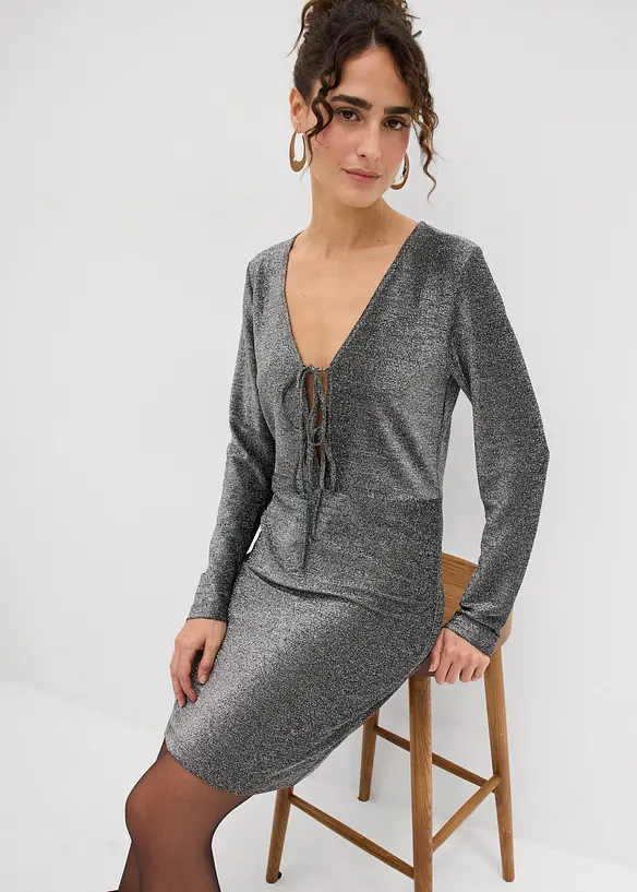 Glittrande miniklänning med rosettdetalj, bonprix