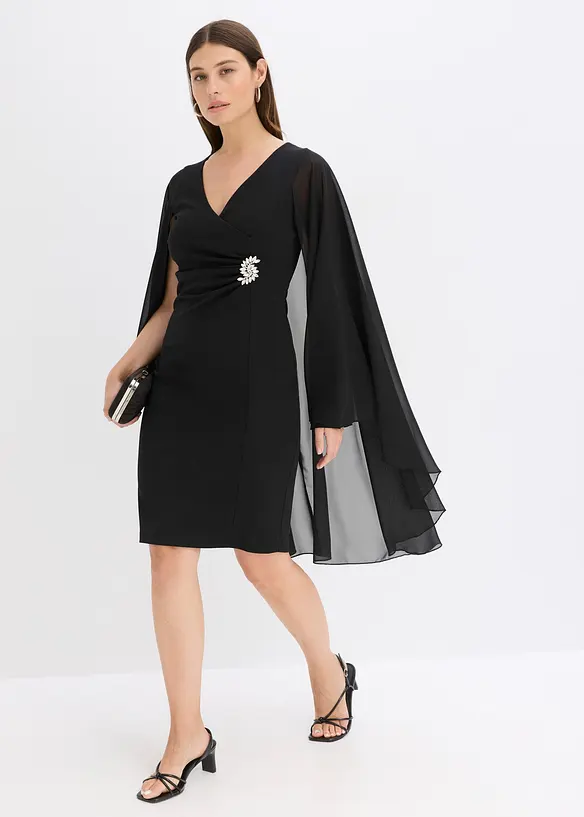 Miniklänning med cape av tunn chiffong, bonprix