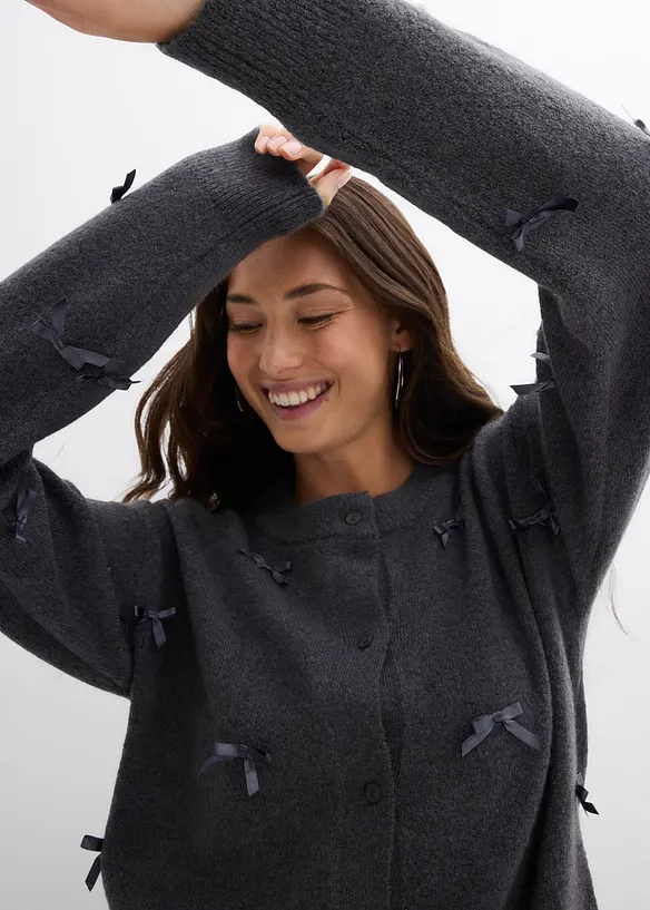 Finstickad cardigan med rosetter, bonprix