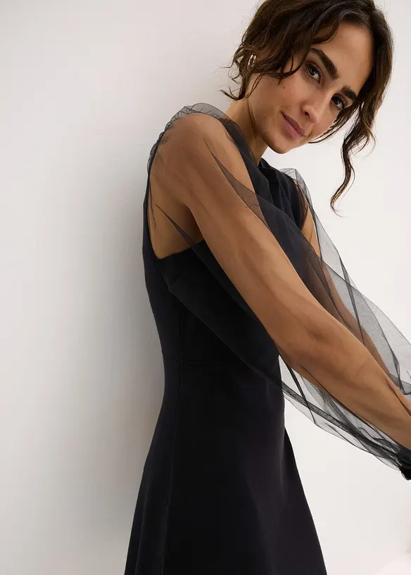 Stickad klänning i följsam viskosmix, bonprix