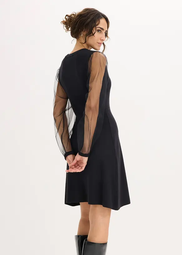 Stickad klänning i följsam viskosmix, bonprix