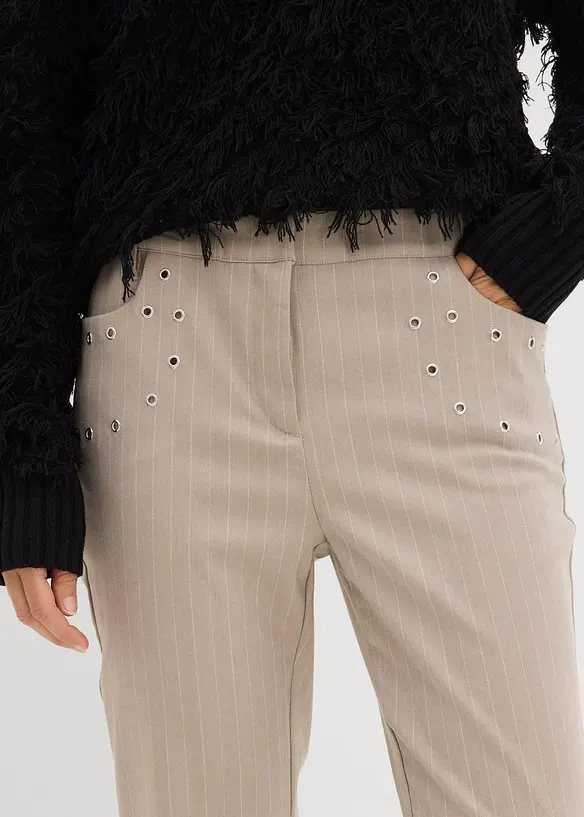 Utsvängd byxa i böljande materialmix, bonprix