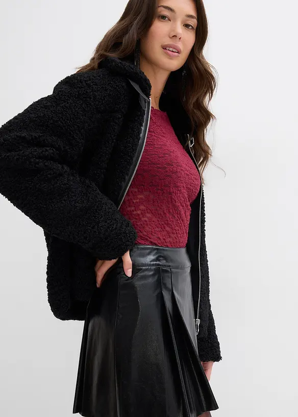 Minikjol i skinnimitation med motveck, bonprix