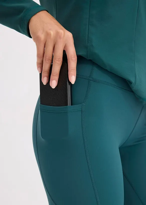 Sportleggings med mobilficka, snabbtorkande, bonprix