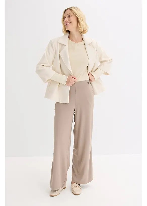 Jerseybyxa med dekorativa slejfar, bonprix