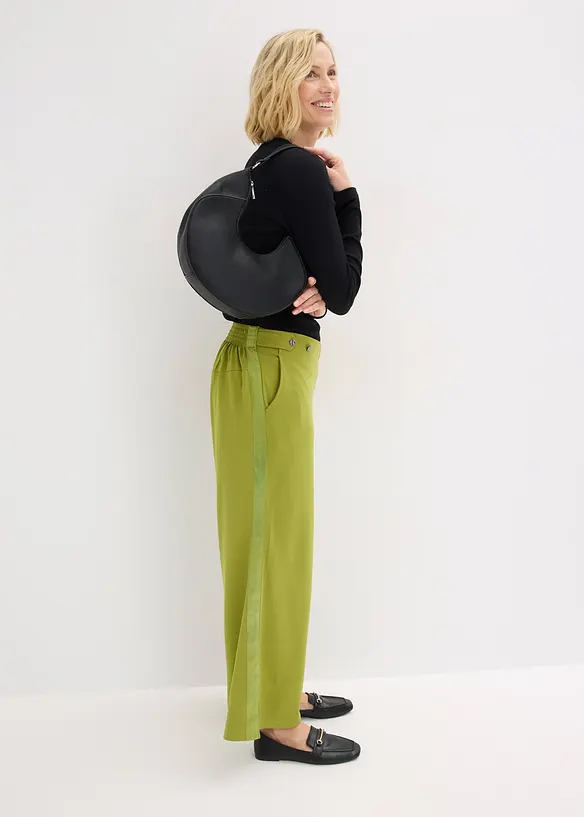 Jerseybyxa med dekorativa slejfar, bonprix