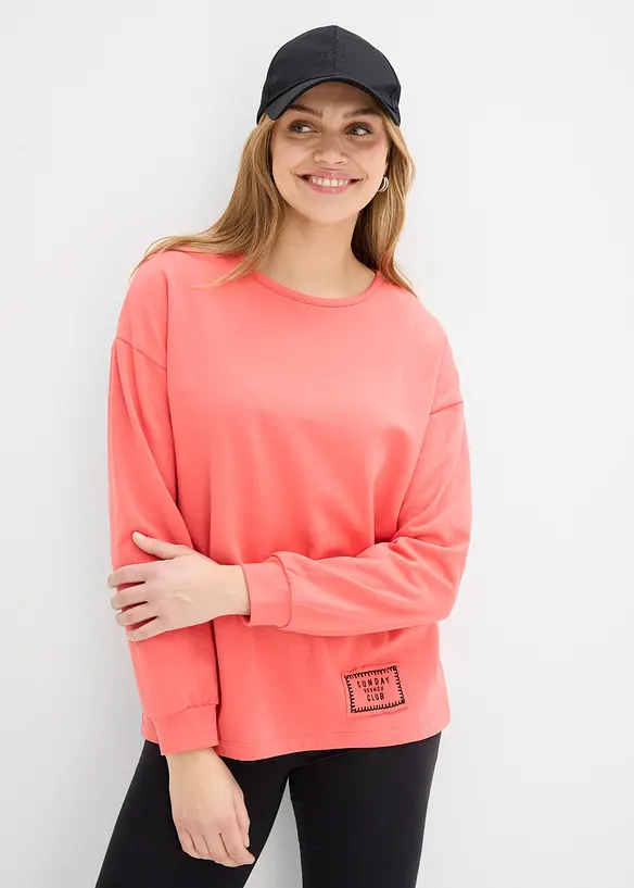 Sweatshirt i bomullsmix som &auml;r l&auml;ngre bak &auml;n fram, bonprix