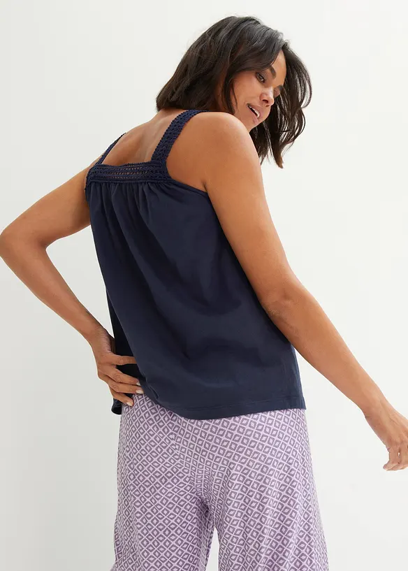 Avslappnat linne med axelband i spets, bonprix