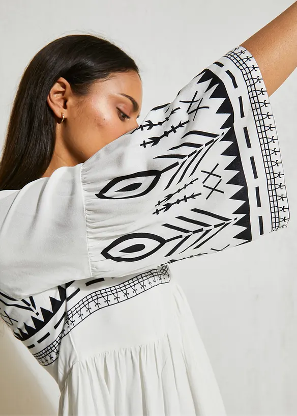 Mellanl&aring;ng kl&auml;nning i f&ouml;ljsam viskos, bonprix