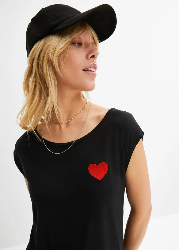 Topp i b&ouml;ljande viskosmix med  med l&auml;ngre rygg, bonprix