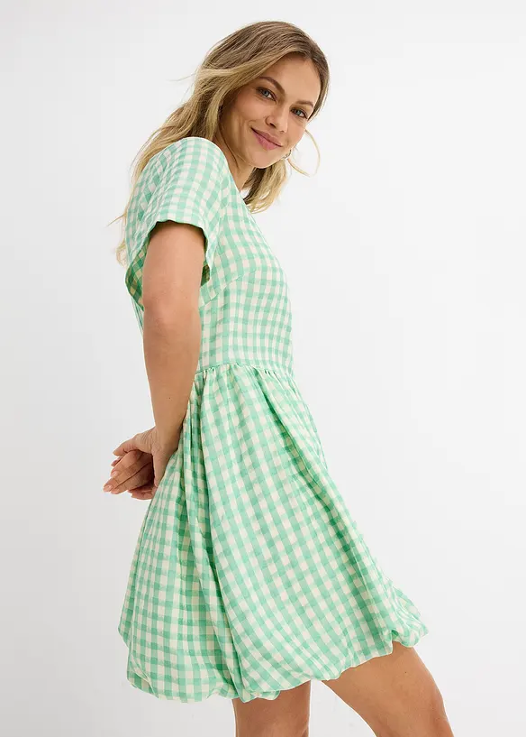 Kort kl&auml;nning med ballongformad nederkant, bonprix