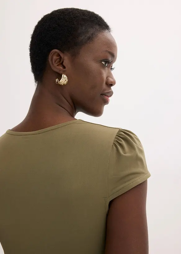 Jerseykl&auml;nning med prydnadssp&auml;nne, bonprix