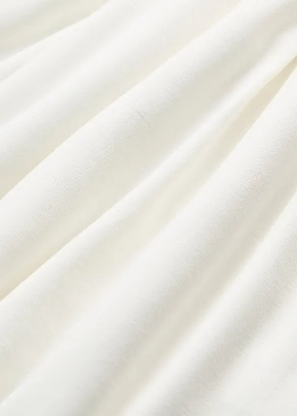 Topp med h&aring;lbroderi p&aring; axlarna, bonprix