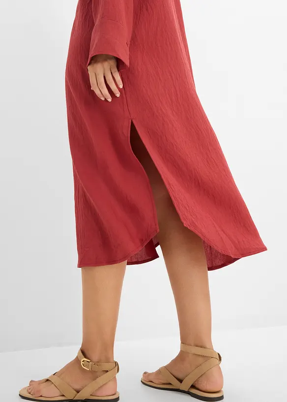 Tunn kaftankl&auml;nning med dekorativa detaljer, bonprix