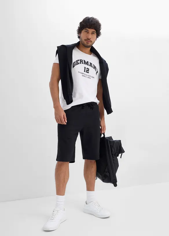 T-shirt av bomull med Germany-tryck, bonprix