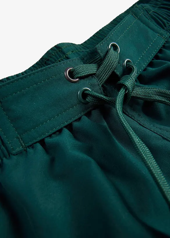 Badshorts med fickor i sidan, bonprix