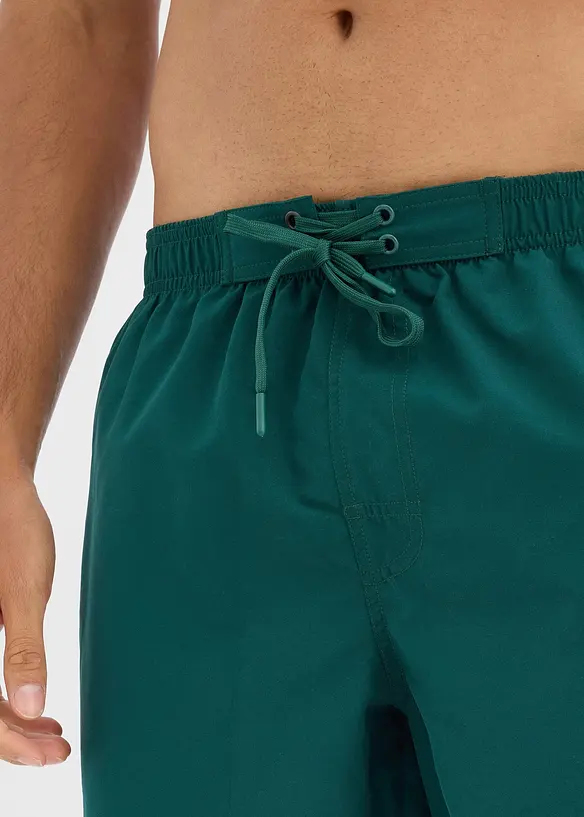 Badshorts med fickor i sidan, bonprix