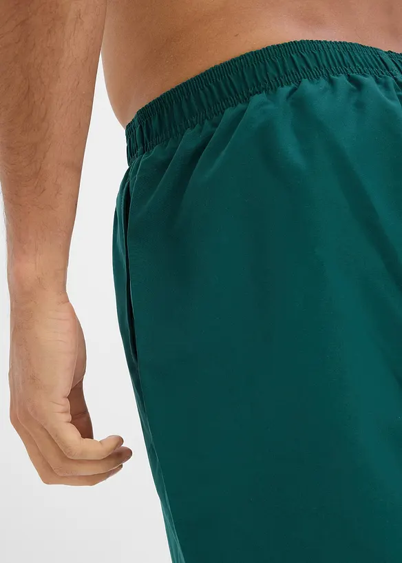 Badshorts med fickor i sidan, bonprix