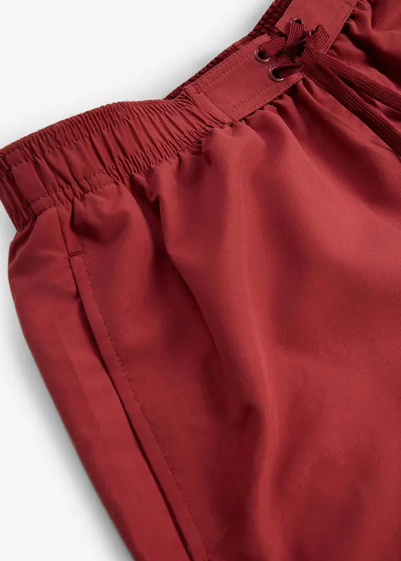 Badshorts med fickor i sidan, bonprix