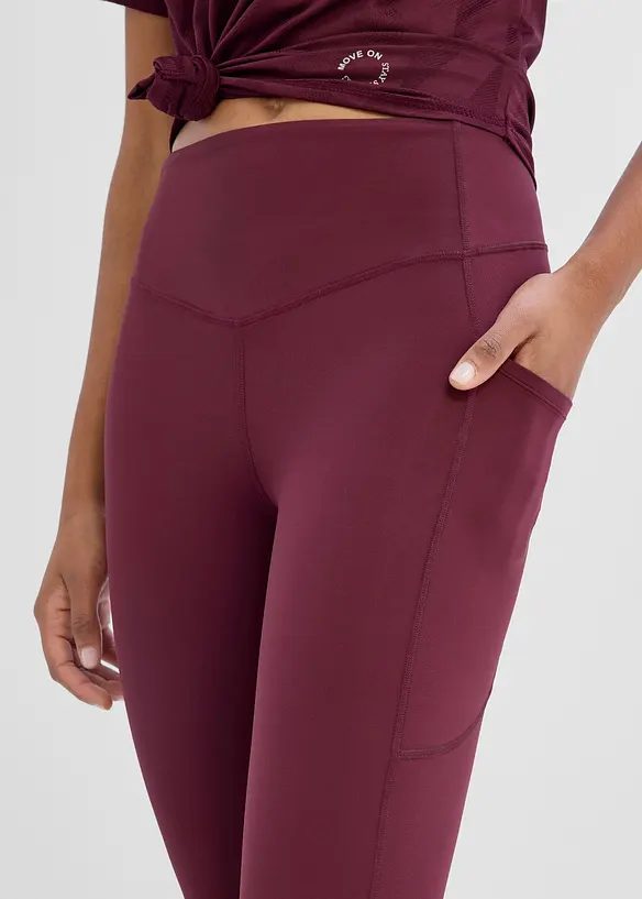 Snabbtorkande sportleggings med mobilficka, utst&auml;llda ben, bonprix