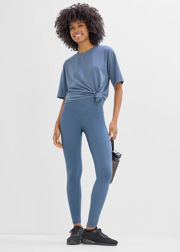 Sportleggings med mobilficka, snabbtorkande, bonprix
