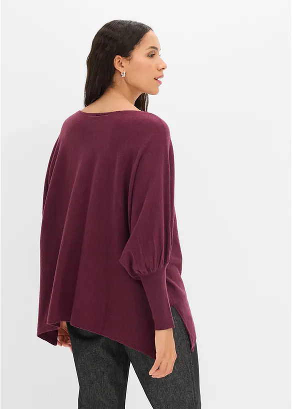 Stickad cape med flikig nederkant, bonprix