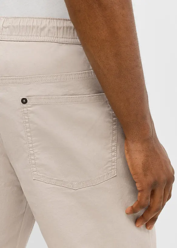 Stretchig dra p&aring;-byxa, normal passform, avsmalnande ben, bonprix