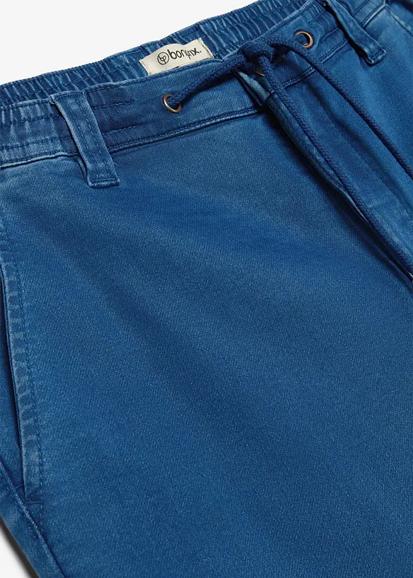 Joggerjeans, Regular Fit med res&aring;rmidja, Tapered, bonprix