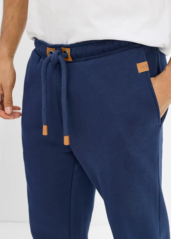 Joggingbyxa av stabilt material med polyuretandetaljer, bonprix