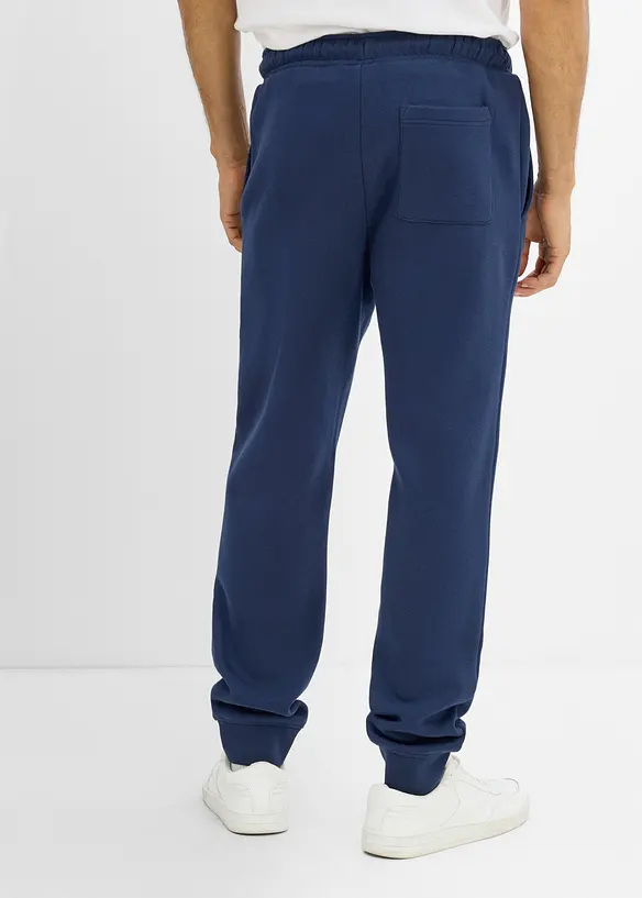 Joggingbyxa av stabilt material med polyuretandetaljer, bonprix