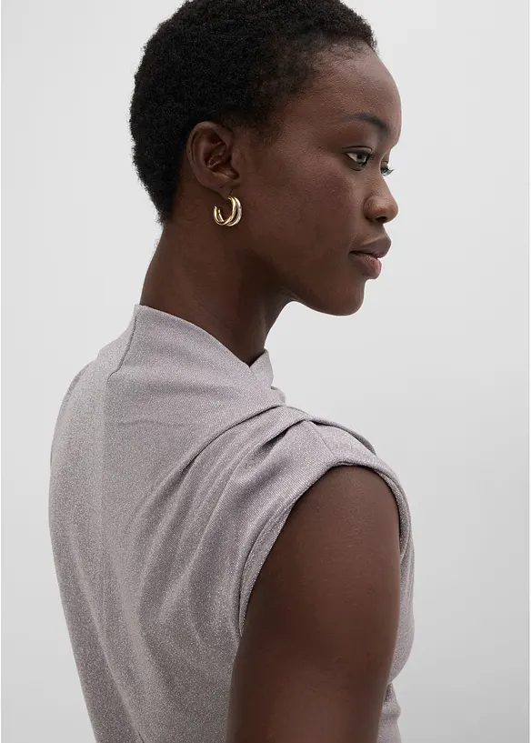 Topp med asymmetrisk nederkant och glitter, bonprix